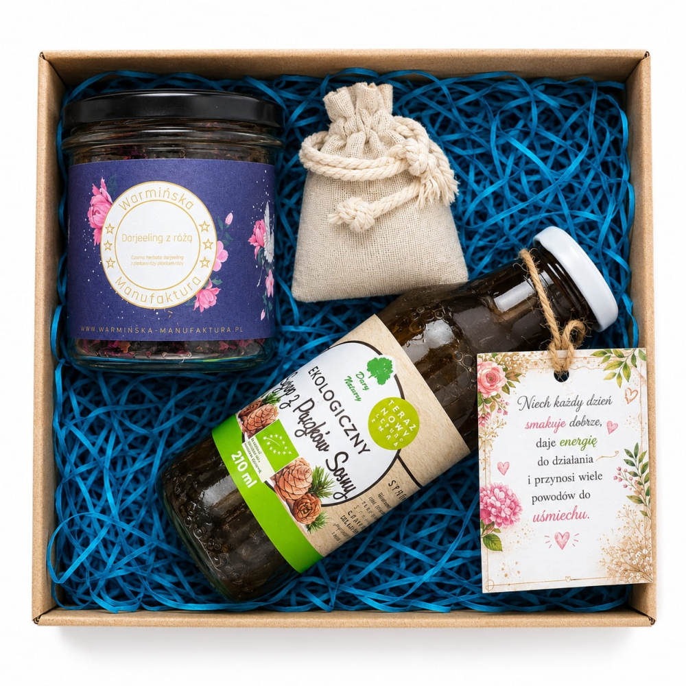 Ekologiczny zestaw prezentowy z herbatą Darjeeling z różą i syropem z pąków sosny to wyjątkowy upominek dla miłośników naturalnych produktów. Eleganckie pudełko kraftowe, ozdobne wypełnienie i dekoracyjna zawieszka.